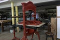 Antique press used by artists on a workshop, Cuba